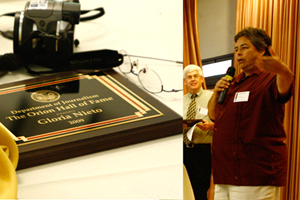 Photo of Gloria Nieto's award and Gloria Nieto