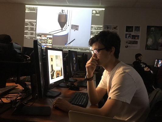 Jordan Chapin and Xavier Burgueno working on models for the VR project.